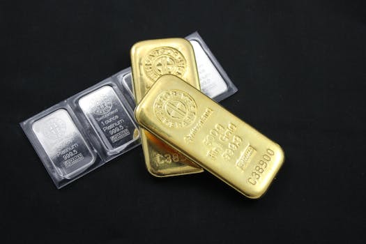 Close-up of gold and platinum bars depicting wealth and investment potential.